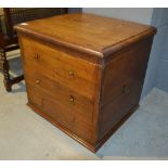 A 19th Century mahogany square commode the moulded edge top above two drawers,
