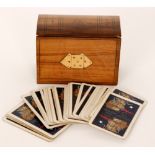An early 20th Century olive wood box form card case together with a set of fifty two White Star