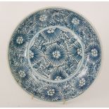 A Chinese Diana Cargo blue and white 'Starburst' shallow dish decorated with a stylised repeat