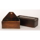 A late 18th Century oak candle box and a letter rack width 30cm (2)