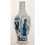 A late 19th Century bottle vase decorated in blue and white with panel scenes of alternate women