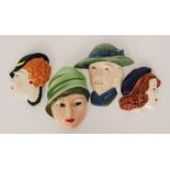 Four later 20th Century wall masks modelled as female heads in profile comprising Moorland,