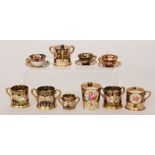 A collection of Crown Staffordshire miniature porcelain to include two three handled tygs,
