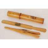 Four pieces of 19th Century Mauchline Ware comprising a pair of glove stretchers with a 'Scene of