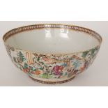 A 19th Century Chinese famille rose footed bowl decorated to the exterior with figures in