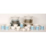 A Royal Worcester Linea pattern dinner service in white porcelain with pale blue linear design and