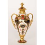 A Royal Crown Derby twin handled vase and cover decorated in the Imari 1128 pattern,