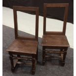 A pair of late 18th to early 19th Century oak backstools,