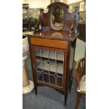 An early 20th Century music or salon side cabinet,