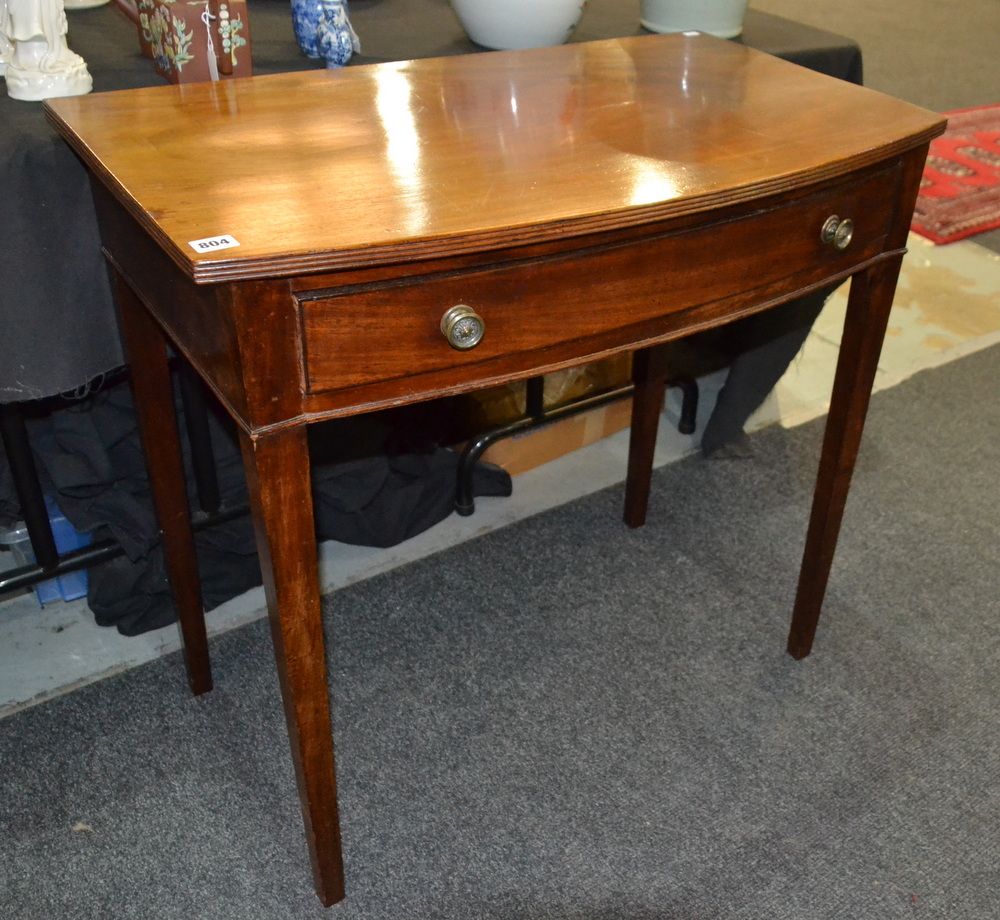 A 19th Century mahogany side table fitted with a single drawer below a reeded edge on square