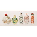 A Chinese Qing Dynasty late 19th Century snuff bottle of compressed ovoid form decorated with