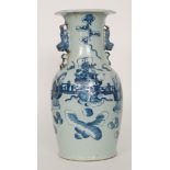 A late 19th to early 20th Century Chinese vase decorated in blue and white with hand painted