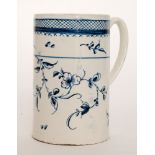 An early 19th Century creamware cider mug decorated with blue floral hand painted sprays below a