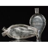An early 19th Century glass twin gimmel flask engraved with a rose and thistles commemoration the