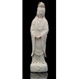 A Ching Dynasty 19th Century Chinese blanc de chine Guanyin Dehua modelled in loose robes standing