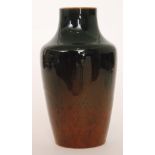 An early 20th Century Ruskin Pottery baluster vase decorated in a tonal brown souffle glaze with