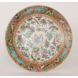 A large late 19th to early 20th Century Chinese export famille rose charger decorated to the