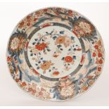 A later 19th Century Japanese Imari charger decorated with flowers, unmarked,