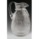 A late 19th Century Stourbridge glass jug in the Aesthetic taste of footed ovoid form with an