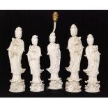 Five assorted later 20th Century Chinese blanc de chine Guanyin figures,