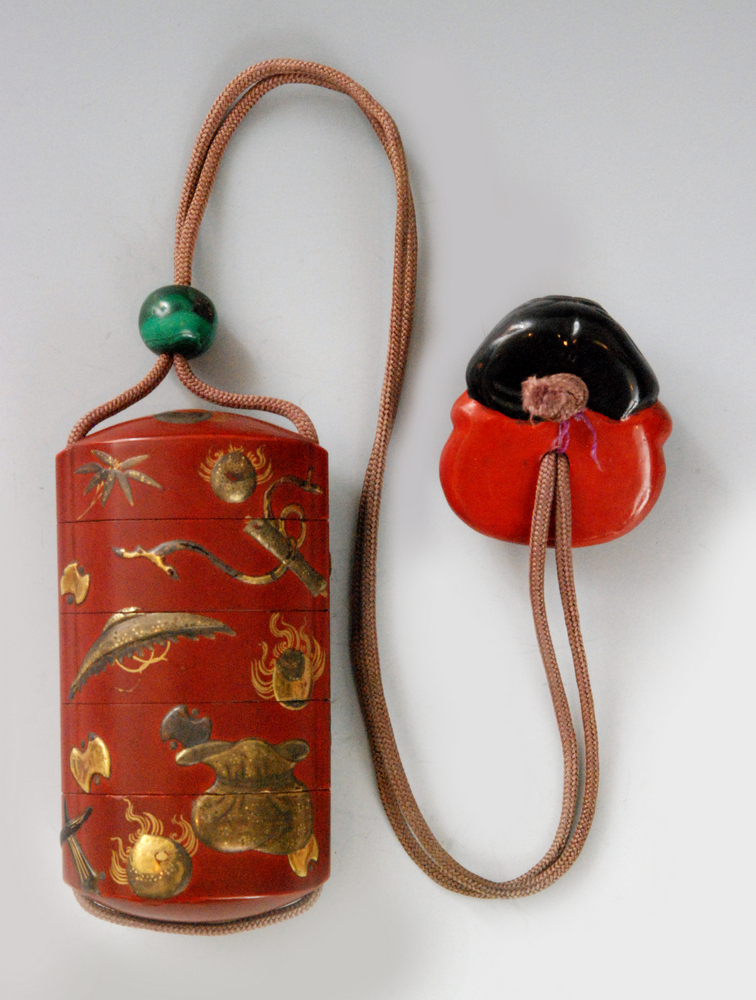 A 19th Century small four cased inro the red/brown ground decorated with gold and silver lacquer - Image 2 of 3