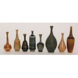 Seven assorted Hoganas post war Swedish studio pottery vases of varying form each decorated with