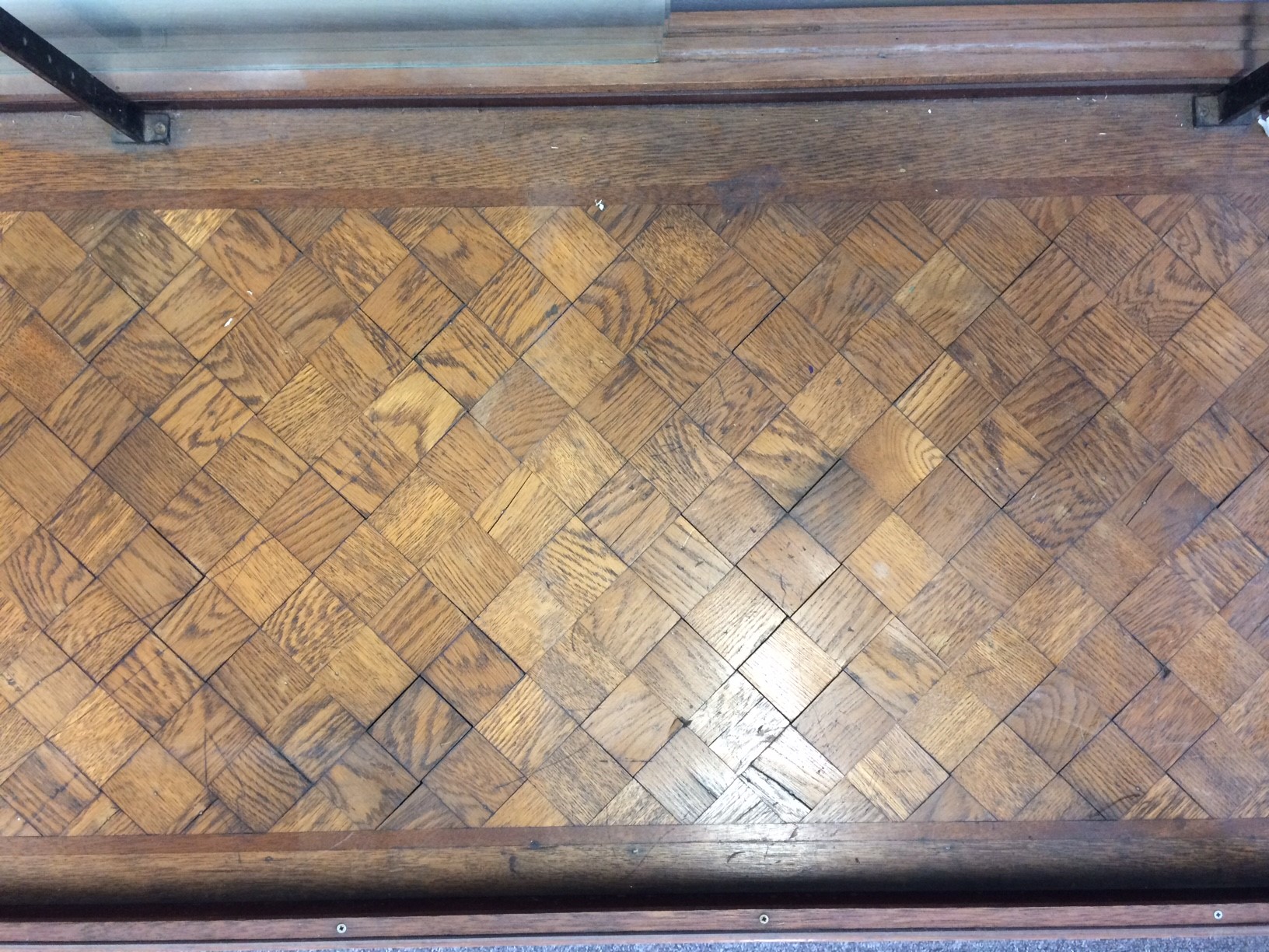 An early 20th Century brass framed and glazed shop display counter with D shaped ends, - Image 2 of 3