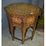 A late 19th to early 20th Century inlaid Moorish octagonal occasional table,