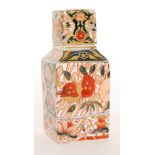 A 19th Century tea caddy decorated in the Imari palette with a stylised floral design,