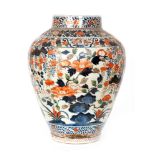 A large late 19th Century Japanese floor vase decorated in the Imari palette with bands of flowers