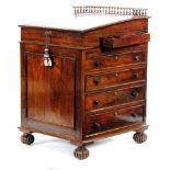 A William IV rosewood Davenport in the manner of Gillows,
