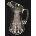 An Essex County Cricket Club presentation glass water jug, engraved with facsimile signatures,