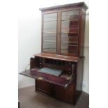 Flann O'Brien's Bookcase / Desk A large William IV period Irish mahogany Secretaire Bookcase,