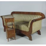 A large figured oak Biedermeier type Settee, covered in Regency stripe material,