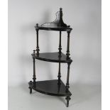 A three tier ebonised Corner Stand, with walnut inlay and gilt decoration, possibly by Gillows.