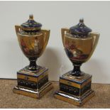 A pair of 19th Century Vienna porcelain two handled Urns,