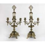 A pair of late 19th Century two branch brass Candelabra, in the Adams taste,