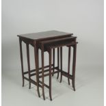 A nest of three matching Edwardian inlaid mahogany Occasional Tables ,