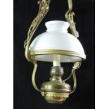 A brass Ceiling Light, with milk glass shade.