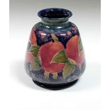 An attractive "Peaches & Blueberries" design Moorcroft Vase, approx.