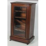 An inlaid Edwardian walnut Music Cabinet, with glazed door,