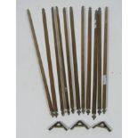 A set of 16 tri-angular brass Stair Rods, and matching brackets, plus two circular stair rods,