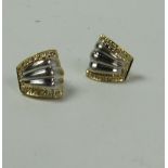 An elegant pair of 18ct gold Earrings / Studs, with 32 small diamonds.