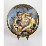 A large late 19th Century painted Continental porcelain Charger,