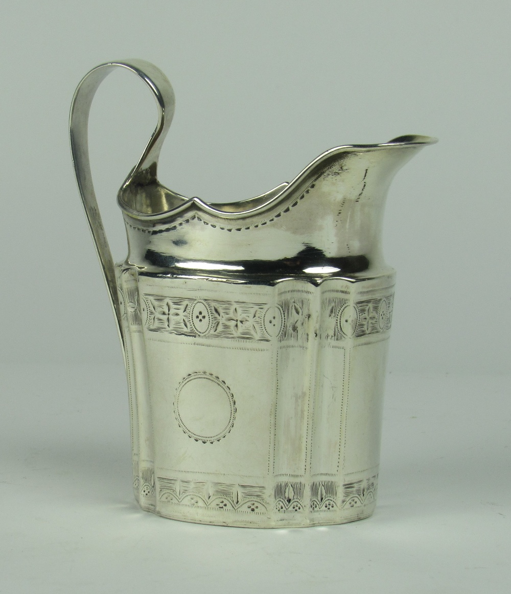A small engraved Irish Georgian silver Cream Jug, Dublin c. 1798, approx. 4 ozs.