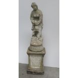 A Victorian style composition Statue on stand, modelled as a girl in low cut dress,
