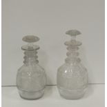 Two very fine similar Georgian period cutglass Decanters, with mushroom stoppers,