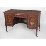 An Edwardian inlaid walnut kneehole Desk, with inset leatherette top over a shaped frieze drawer,