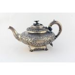 A heavy embossed William IV English silver Teapot, London c. 1836, possibly by I.J.