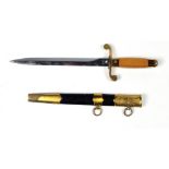 A good quality Russian Dagger, with decorated brass and leather scabbard, 21cms (8 1/4") blade.